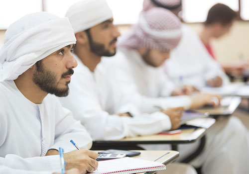 H.H. Sheikh Hamdan Bin Zayed scholarship – Scholars taking notes in class
